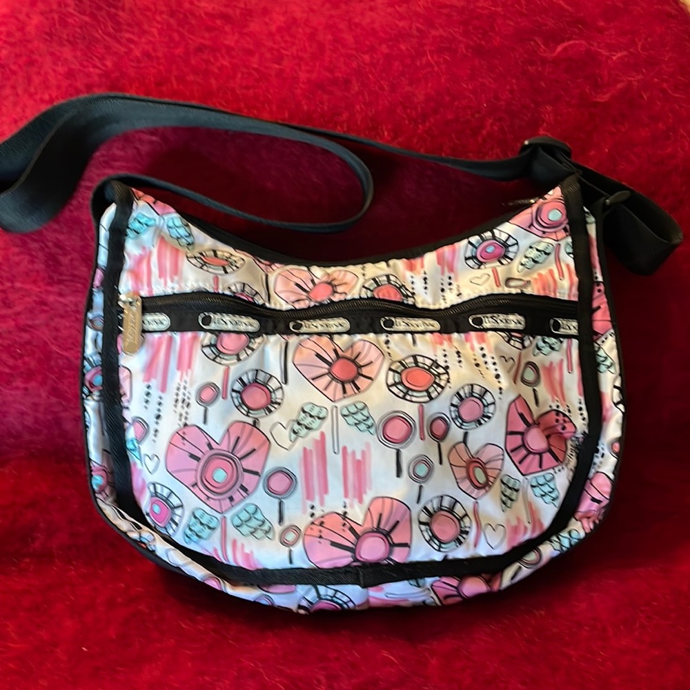 NWOT LeSportsac crossbody bag Hobo Lolli pink blue black hearts